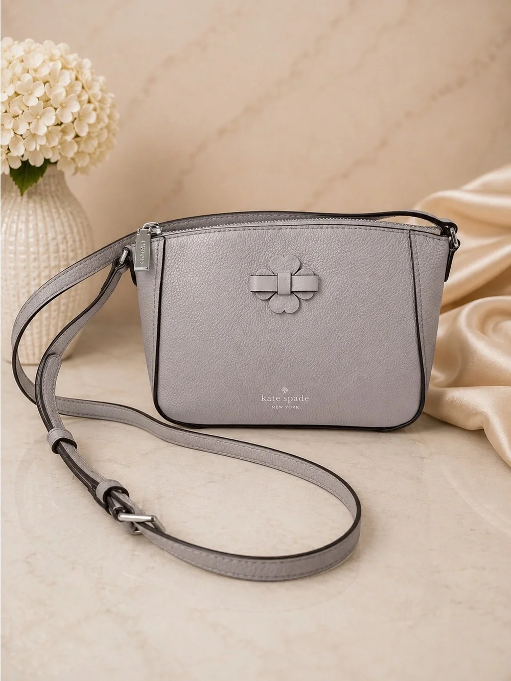 kate spade Pebbled Leather Crossbody Bag in Soft Taupe